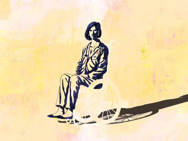 yellow and black block print of woman using wheelchair